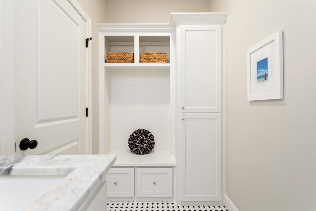 23630 Champion Drive Lindale, TX 75771 - Photo 16 of 36 a bathroom with a sink and a mirror
