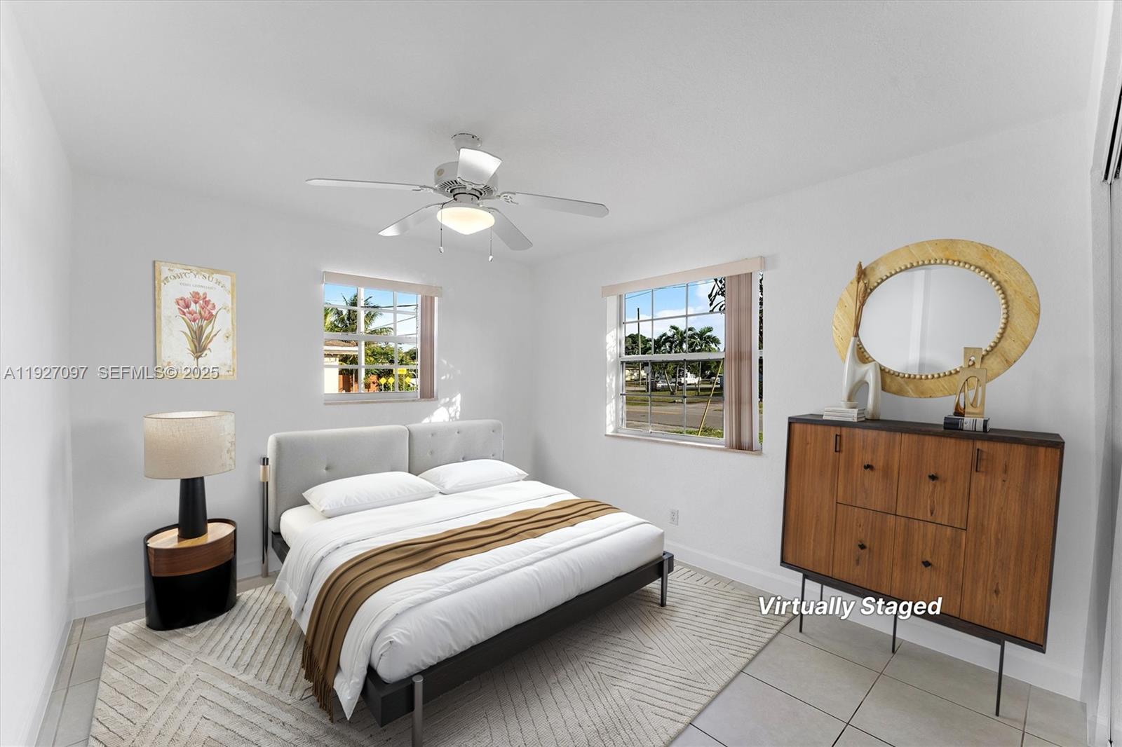 5511 Southwest 36th Court Davie, FL 33314 - Photo 15 of 23 a bedroom with a bed and window