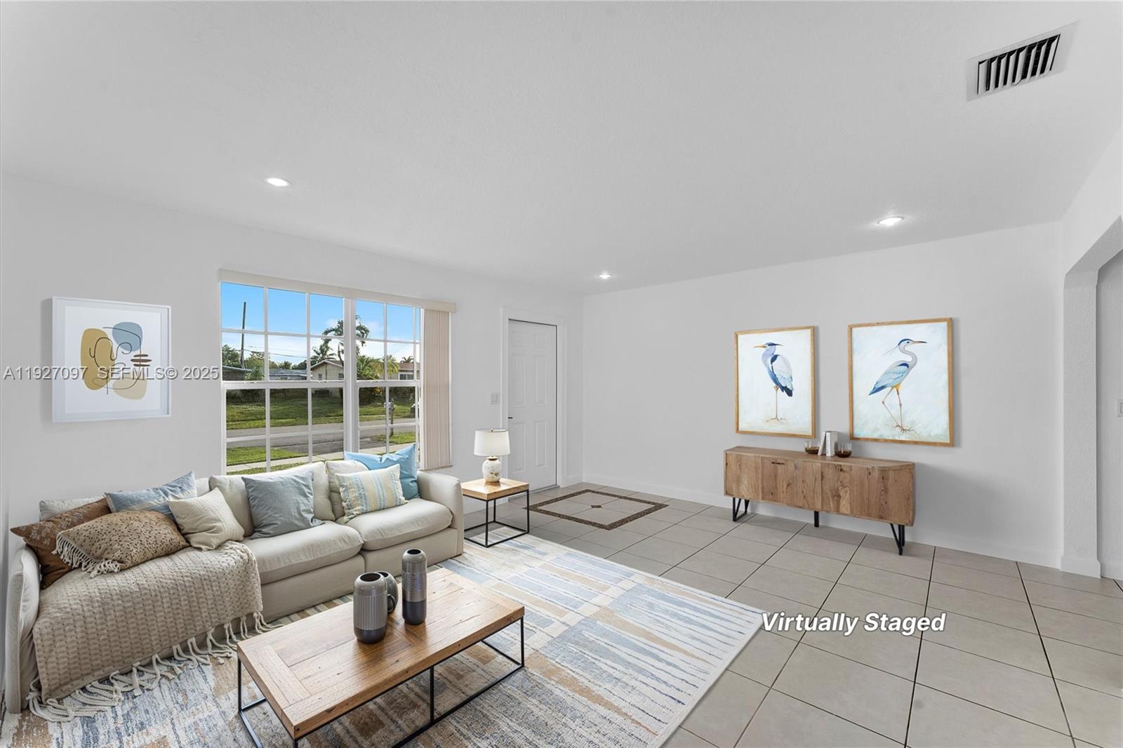 5511 Southwest 36th Court Davie, FL 33314 - Photo 3 of 23 a living room with furniture and a large window