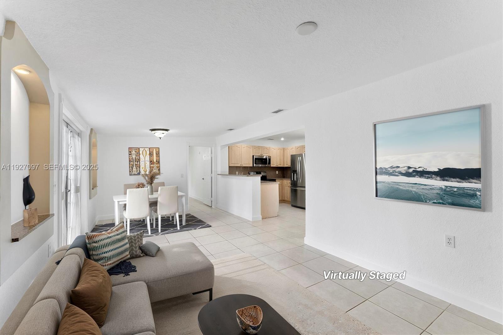 5511 Southwest 36th Court Davie, FL 33314 - Photo 5 of 23 a living room with furniture and view of kitchen