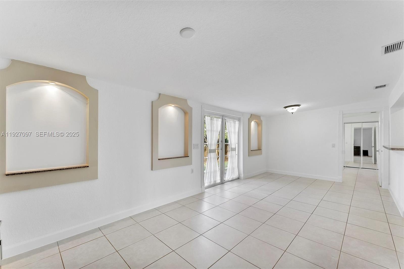 5511 Southwest 36th Court Davie, FL 33314 - Photo 7 of 23 a view of an empty room and window