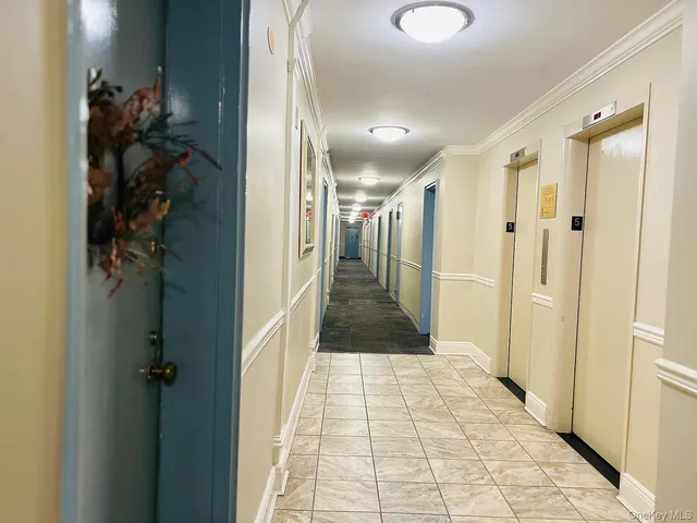 a bathroom with a shower and a mirror