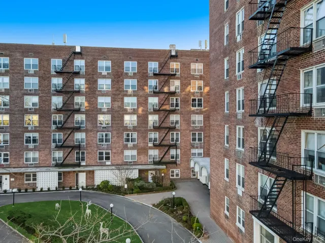 a front view of a building with street view