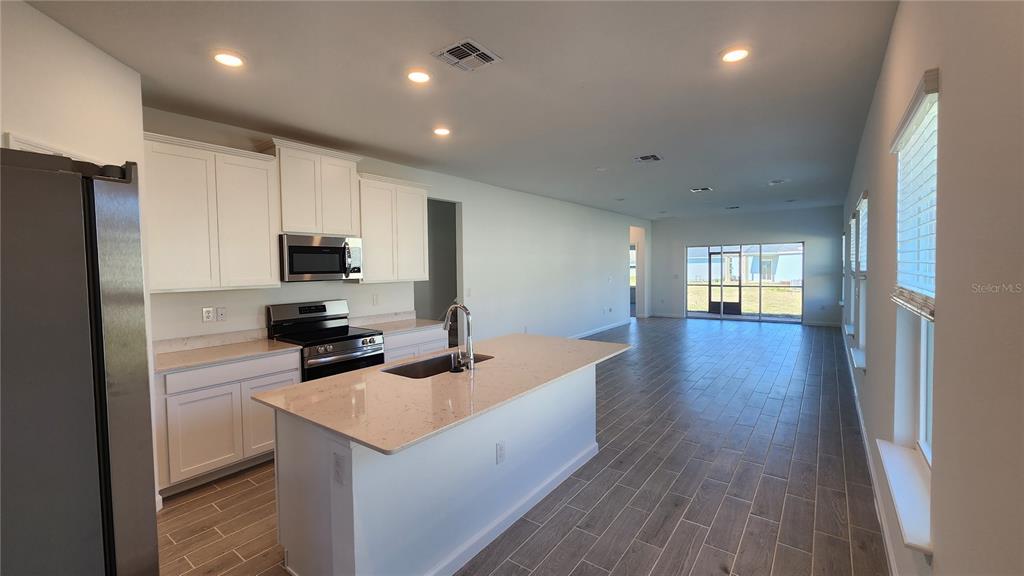 4530 Northwest 14th Loop Ocala, FL 34482 - Photo 3 of 19 New SS appliances; quartz countertops