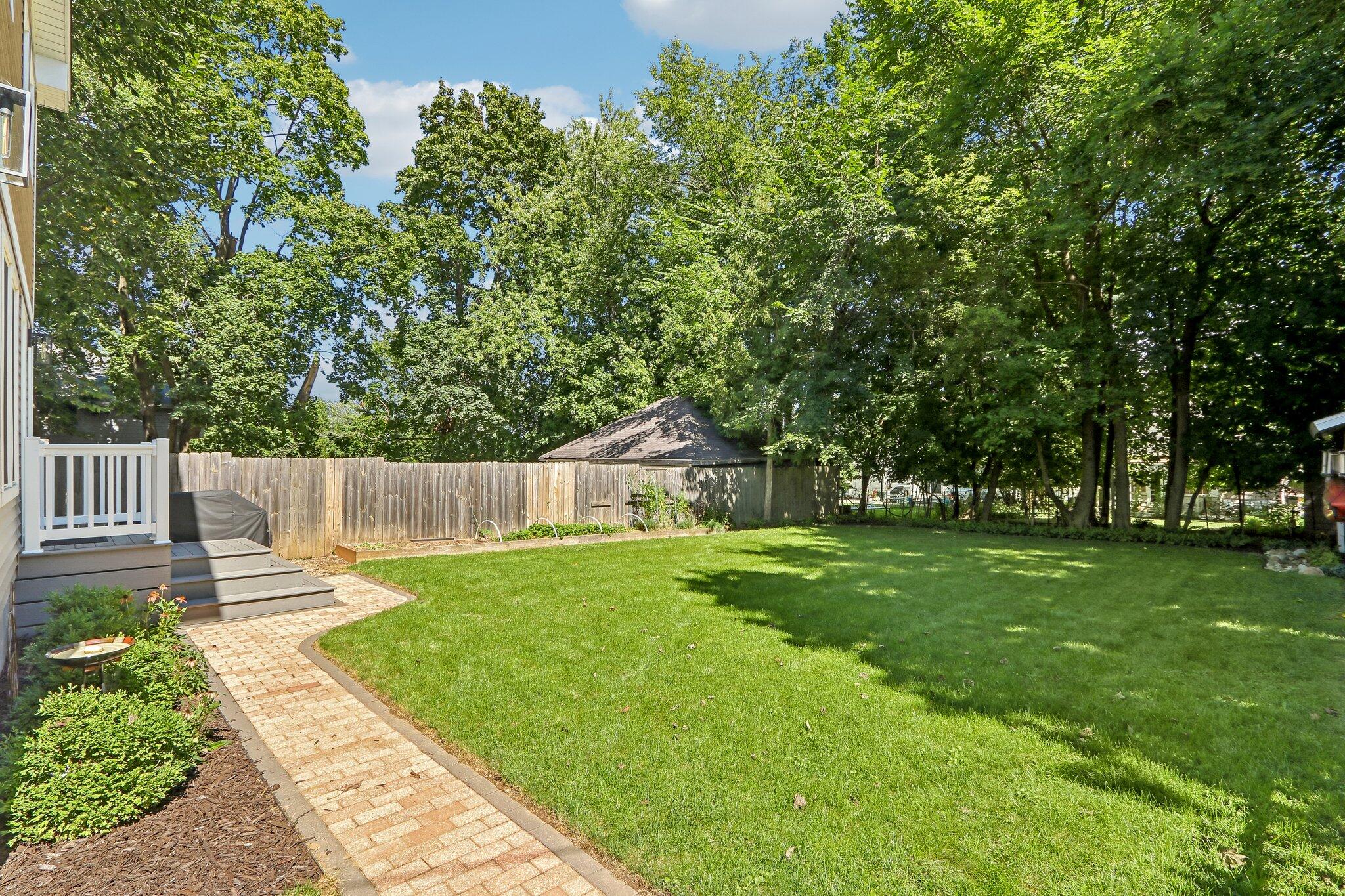 85 Clover Street Williams Bay, WI 53191 - Photo 44 of 53 Backyard Lawn