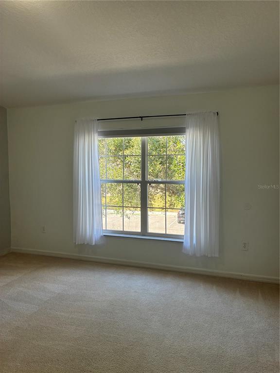 1110 Sleepy Oak Drive Wesley Chapel, FL 33543 - Photo 13 of 35 an empty room with a window