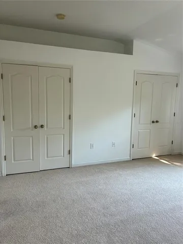 a bathroom with a toilet and a bathtub