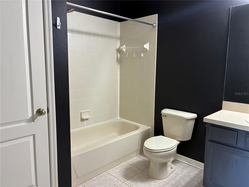 1110 Sleepy Oak Drive Wesley Chapel, FL 33543 - Photo 21 of 35 a bathroom with a toilet and a bathtub