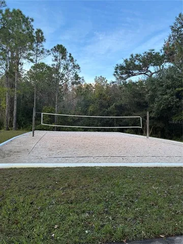 a view of a swimming pool with an outdoor space