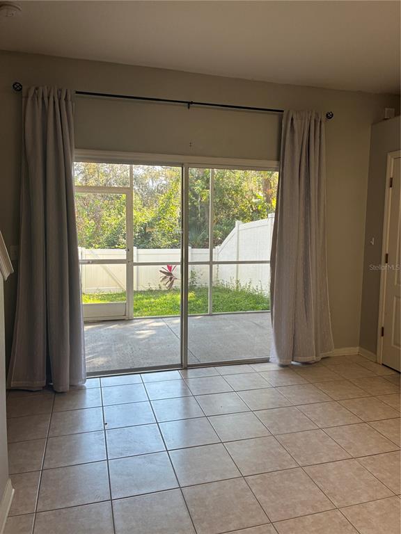 1110 Sleepy Oak Drive Wesley Chapel, FL 33543 - Photo 5 of 35 a view of empty room with windows