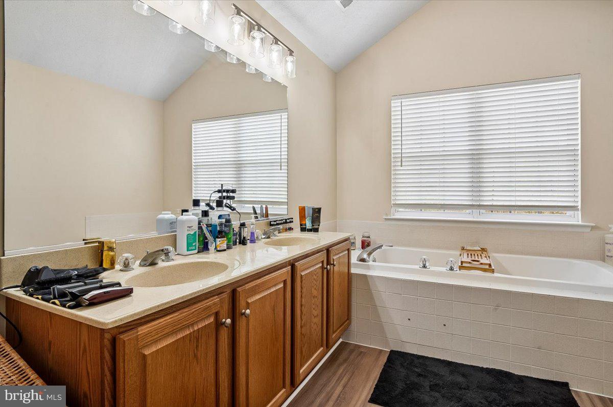 3470 Malcolm Road Brandywine, MD 20613 - Photo 15 of 36 a kitchen with a sink stove and cabinets