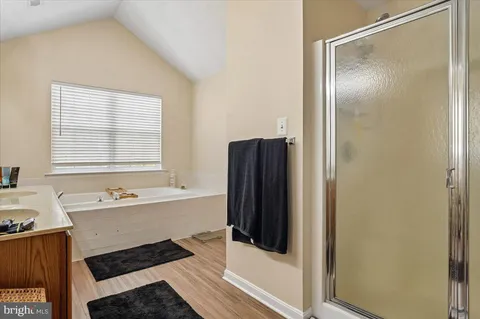 a bathroom with a bathtub and a sink