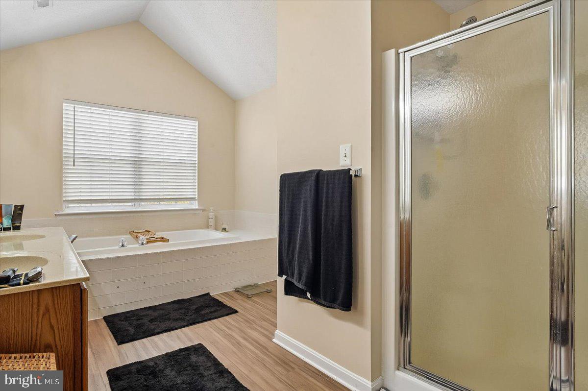 3470 Malcolm Road Brandywine, MD 20613 - Photo 16 of 36 a bathroom with a bathtub and a sink