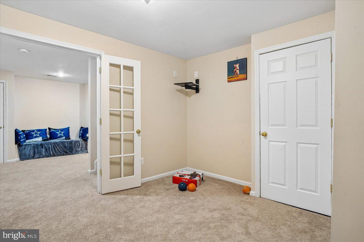 3470 Malcolm Road Brandywine, MD 20613 - Photo 30 of 36 an entryway and livingroom view