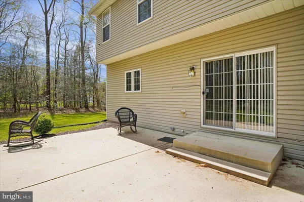 a house view with a backyard space