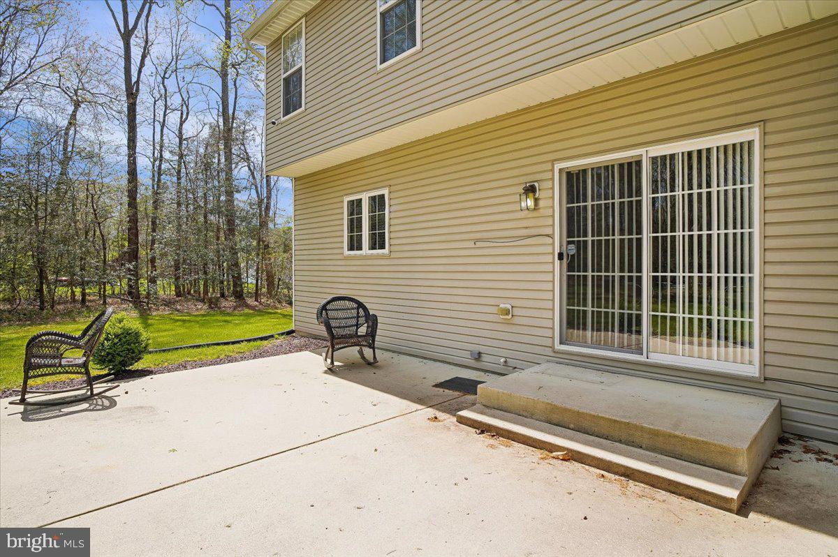 3470 Malcolm Road Brandywine, MD 20613 - Photo 34 of 36 a house view with a backyard space