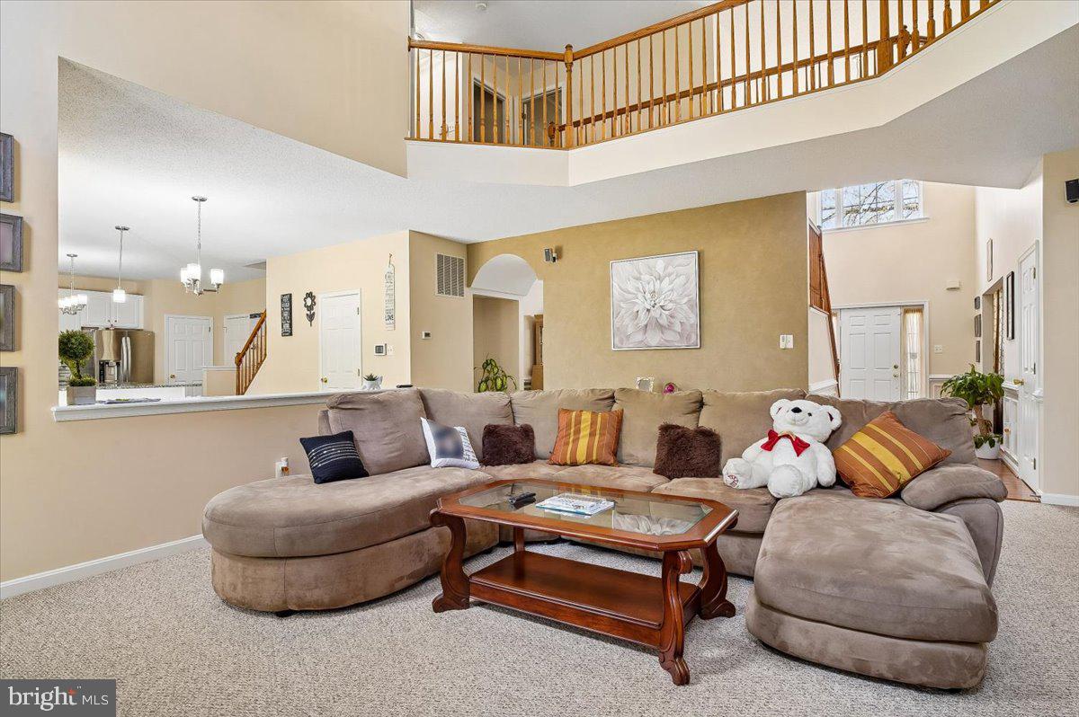 3470 Malcolm Road Brandywine, MD 20613 - Photo 5 of 36 a living room with furniture and a large window