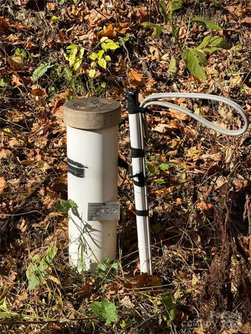 a view of outdoor space with playground and tree
