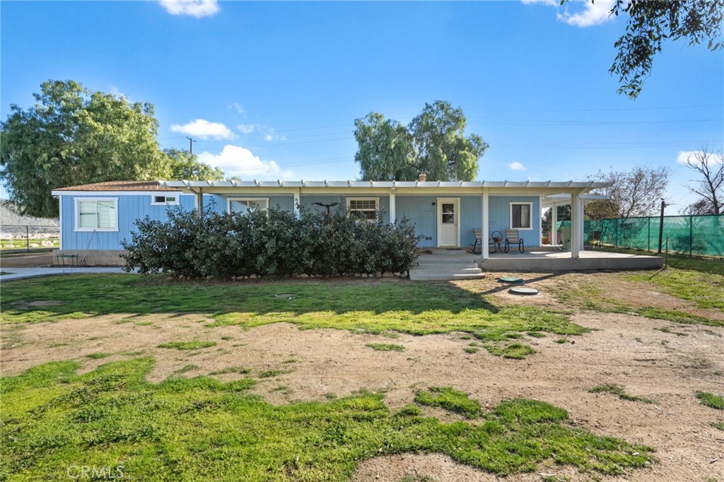 31615 Leon Road Winchester, CA 92596 - Photo 11 of 61 a house view with swimming pool