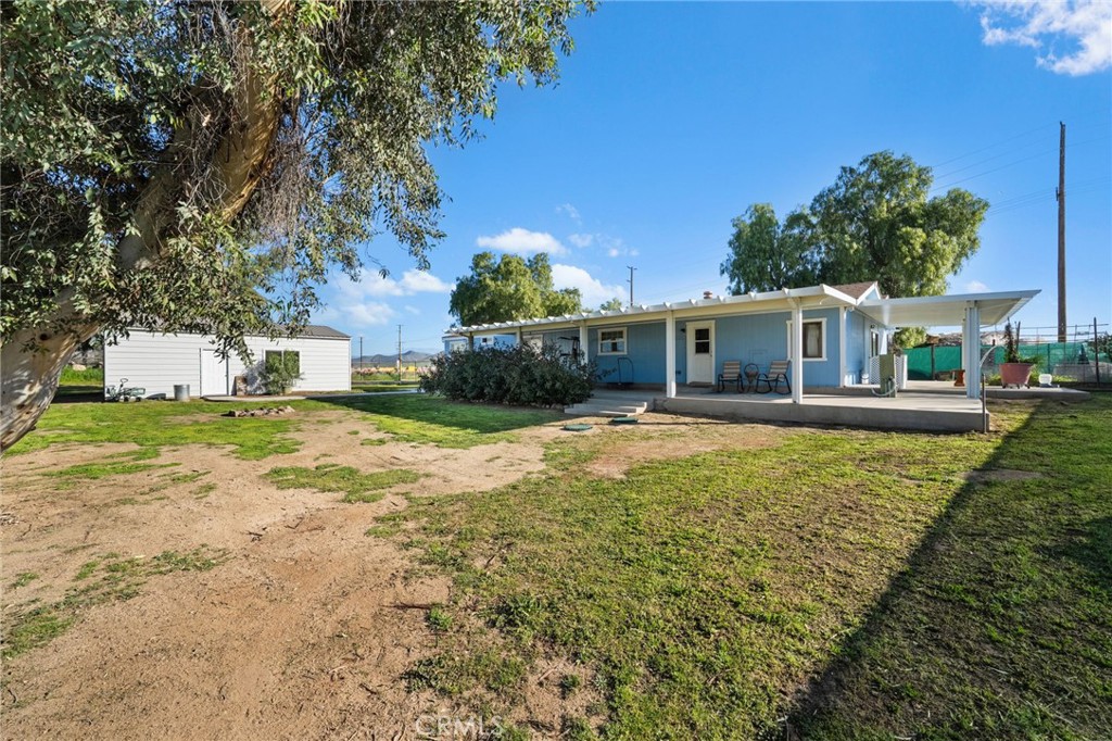 31615 Leon Road Winchester, CA 92596 - Photo 13 of 71 View from back of home showing garage/workshop
