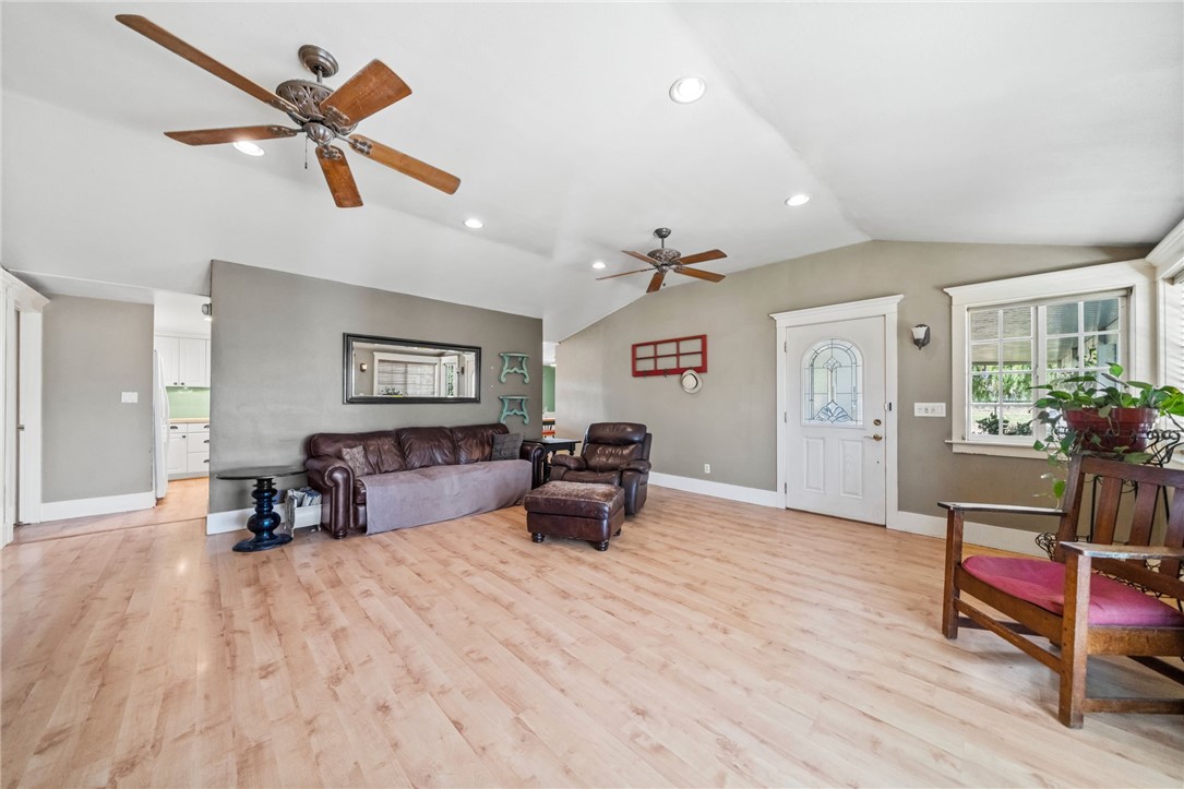 31615 Leon Road Winchester, CA 92596 - Photo 16 of 61 a living room with furniture and a wooden floor