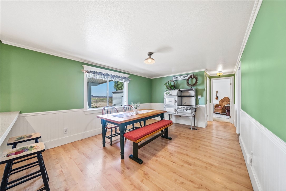 31615 Leon Road Winchester, CA 92596 - Photo 22 of 61 a living room with furniture and a wooden floor