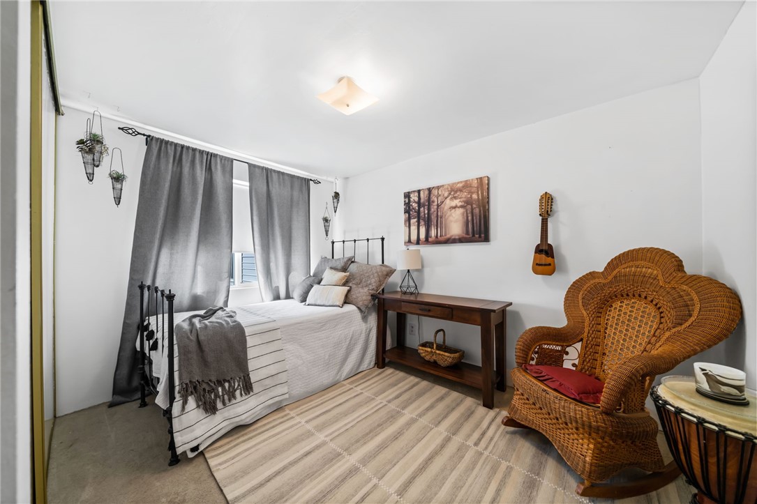 31615 Leon Road Winchester, CA 92596 - Photo 27 of 61 a bedroom with a bed and a dresser
