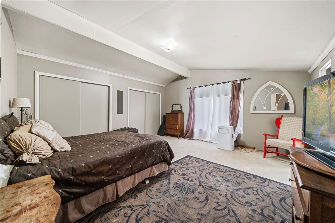 31615 Leon Road Winchester, CA 92596 - Photo 28 of 61 a bedroom with a bed and a dresser