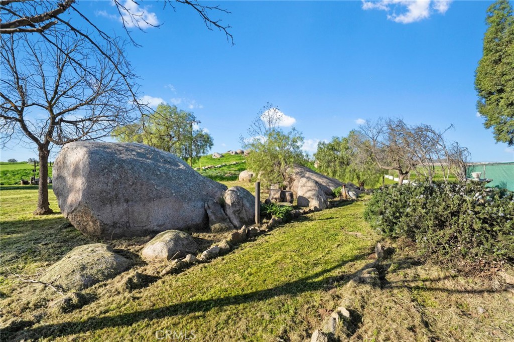 31615 Leon Road Winchester, CA 92596 - Photo 39 of 71 a view of a backyard of the house