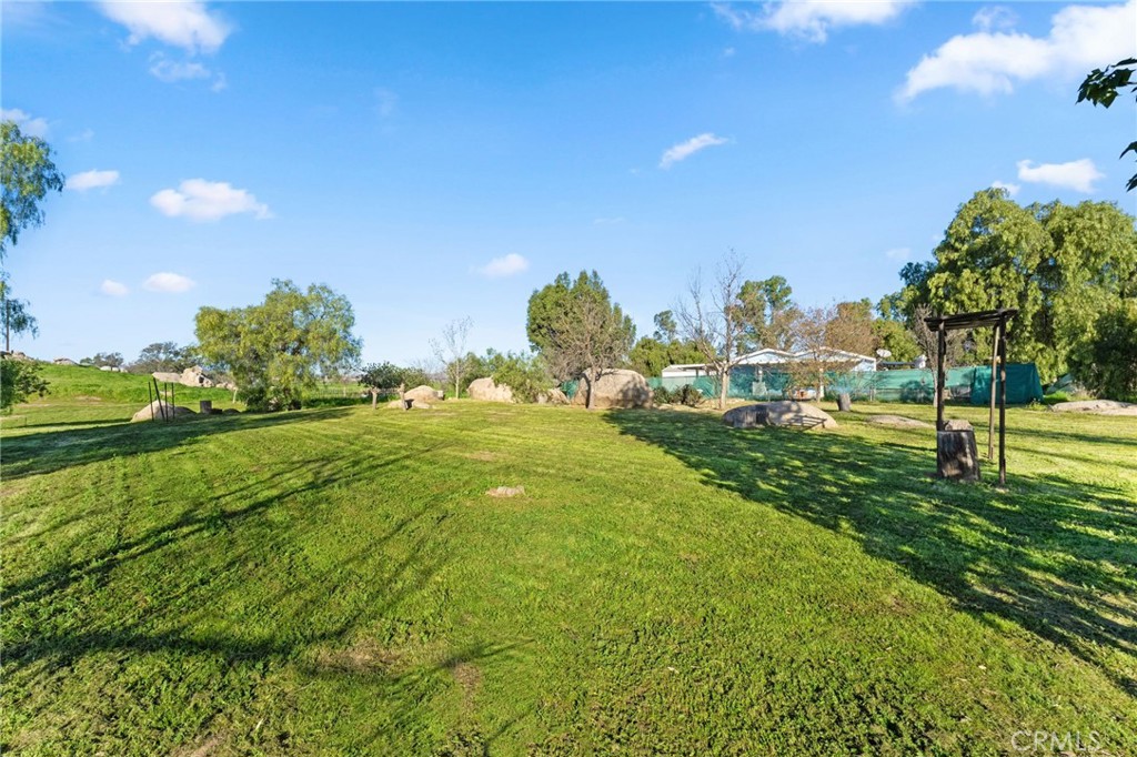 31615 Leon Road Winchester, CA 92596 - Photo 39 of 61 a view of a grassy area with an trees