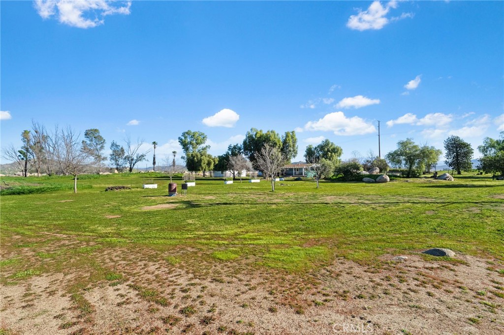 31615 Leon Road Winchester, CA 92596 - Photo 45 of 61 a view of a golf course with a big yard