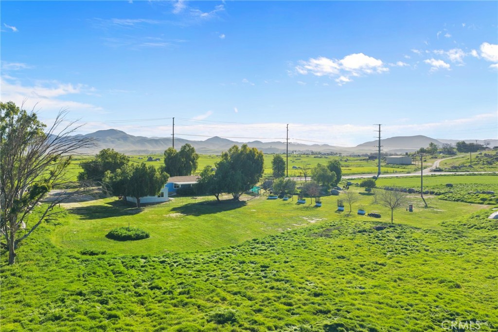 31615 Leon Road Winchester, CA 92596 - Photo 59 of 61 a view of a golf course with a swimming pool