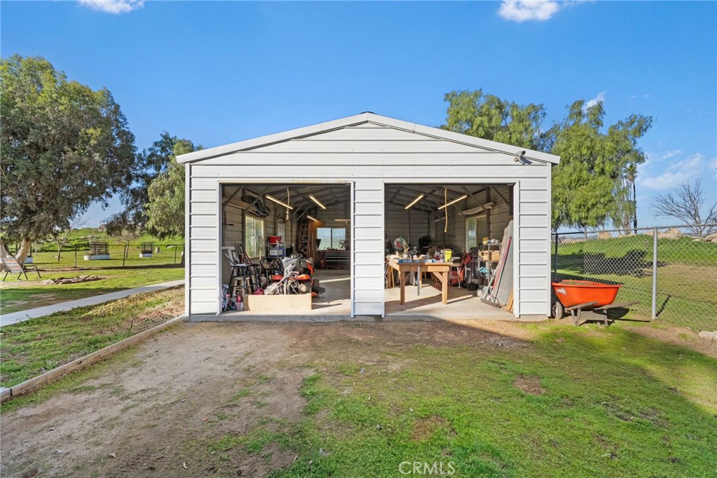 31615 Leon Road Winchester, CA 92596 - Photo 7 of 71 a view of a house with backyard porch and sitting area