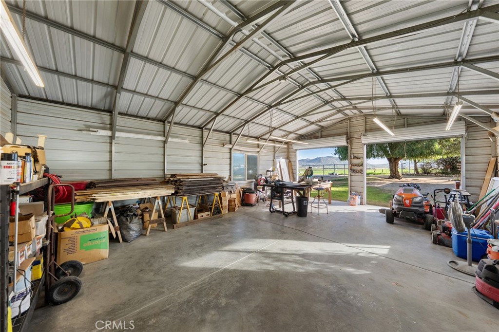 31615 Leon Road Winchester, CA 92596 - Photo 9 of 61 Looking out from the back of the garage/workshop