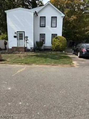 a front view of house with yard