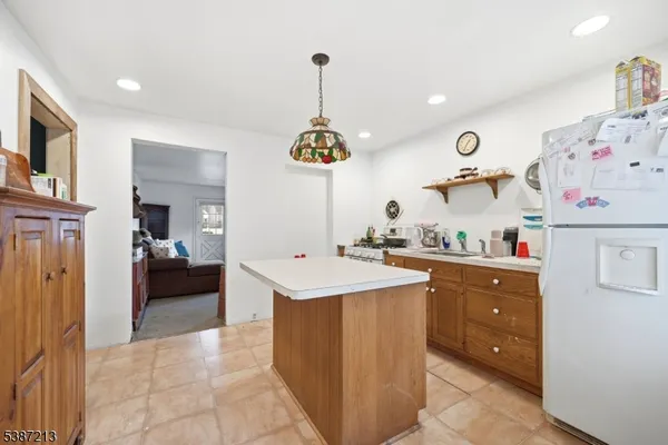 a very nice looking room with a sink and cabinets
