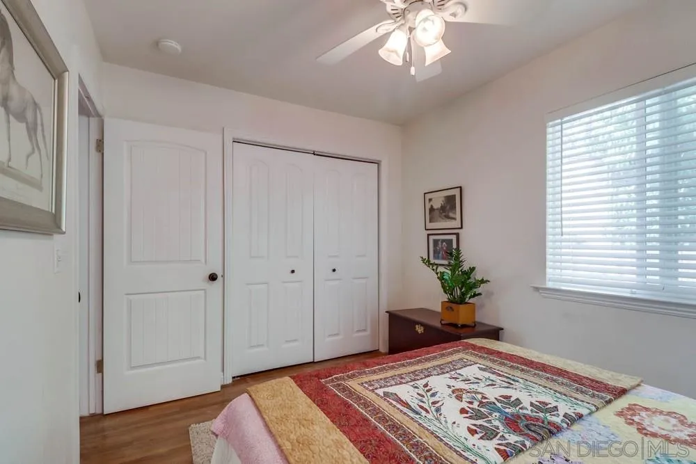 10436 Don Pico Road Spring Valley, CA 91978 - Photo 15 of 25 a bedroom with a bed and a window