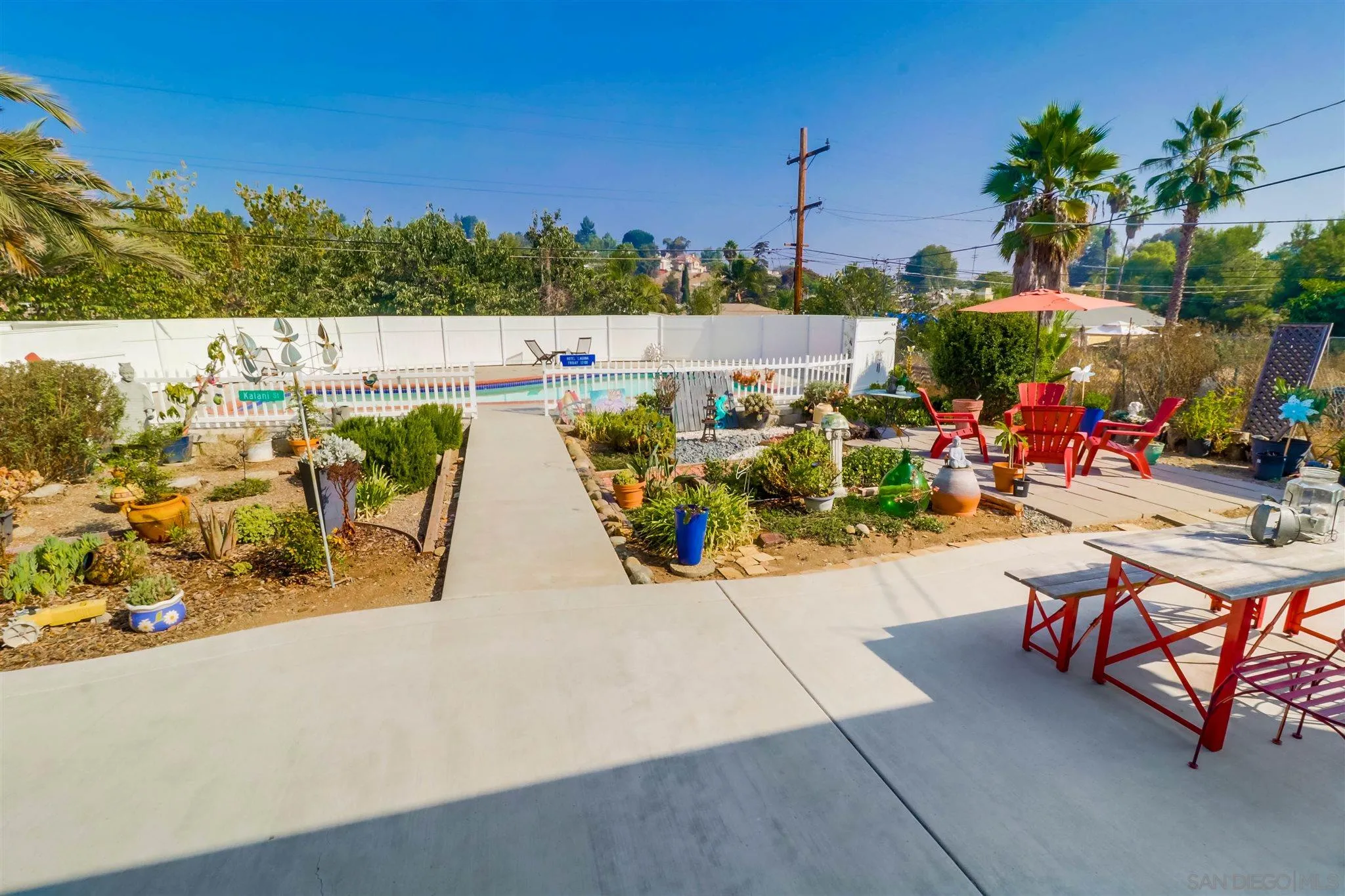 10436 Don Pico Road Spring Valley, CA 91978 - Photo 18 of 25 a view of swimming pool with outdoor seating and plants