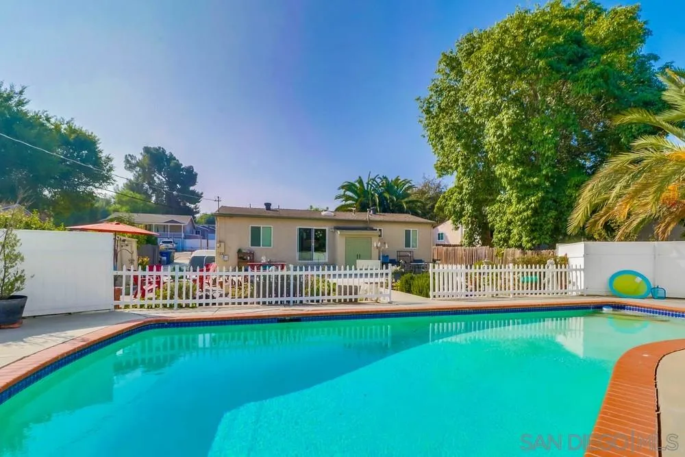 10436 Don Pico Road Spring Valley, CA 91978 - Photo 25 of 25 a front view of a house with a garden and deck