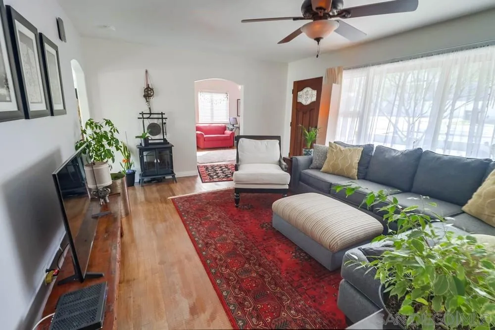 10436 Don Pico Road Spring Valley, CA 91978 - Photo 6 of 25 a living room with furniture and a wooden floor