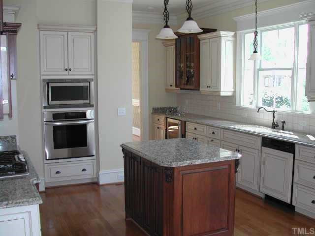 7830 Monument Lane Raleigh, NC 27615 - Photo 10 of 10 Gourmet Kitchen features Stainless Steel Appliances, Granite Countertops and large efficient layout Other