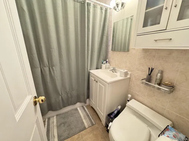 a bathroom with sink and mirror