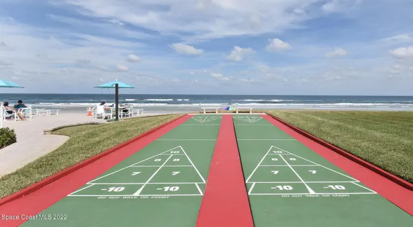 a room with pool and view