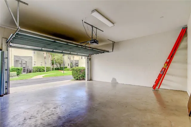 a view of empty room with fan