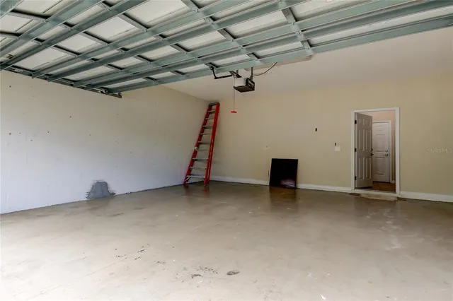 a view of a room with wooden walls