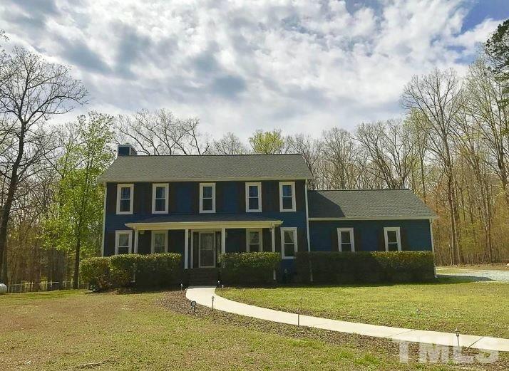 300 Barclay Road Durham, NC 27712 - Photo 1 of 25 a front view of a house with a yard