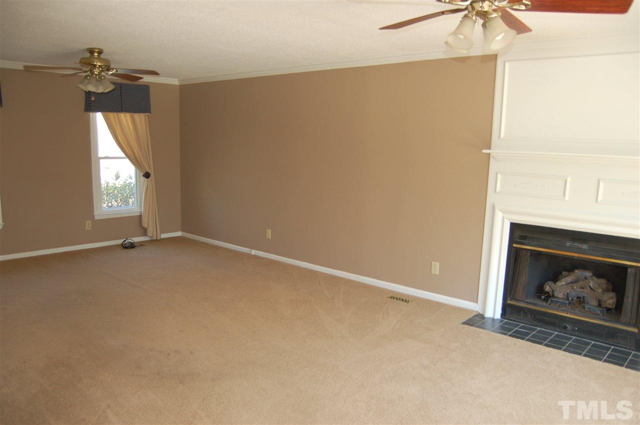 300 Barclay Road Durham, NC 27712 - Photo 11 of 25 a view of empty room with window and fireplace