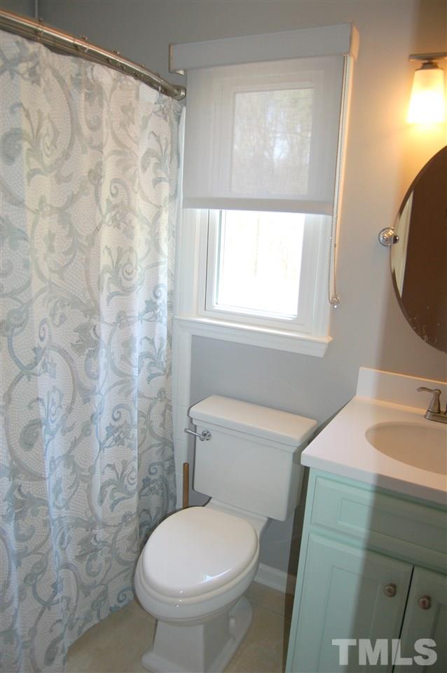 300 Barclay Road Durham, NC 27712 - Photo 20 of 25 a bathroom with a sink and a toilet
