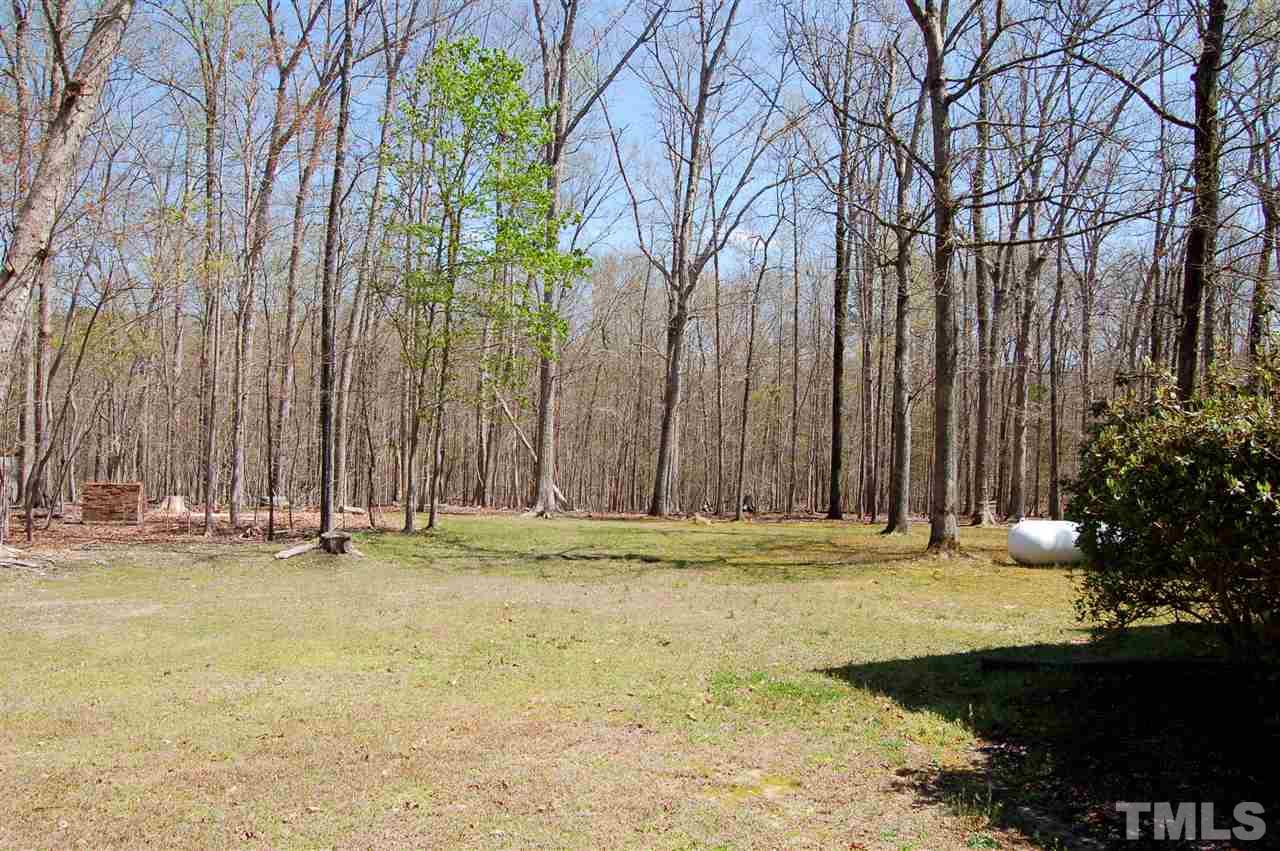 300 Barclay Road Durham, NC 27712 - Photo 24 of 25 a view of outdoor space with swimming pool and trees