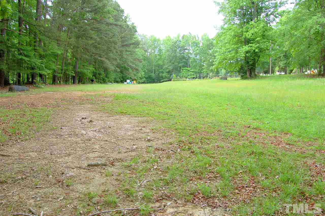 300 Barclay Road Durham, NC 27712 - Photo 25 of 25 a view of a field with trees in the background